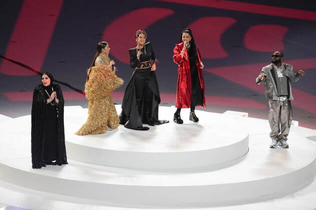 (221218) -- LUSAIL, Dec. 18, 2022 -- Singers perform during the closing ceremony prior to the Final between Argentina and France at the 2022 FIFA World Cup, WM, Weltmeisterschaft, Fussball at Lusail Stadium in Lusail, Qatar, Dec. 18, 2022. ) (SP)QATAR-LUSAIL-2022 WORLD CUP-FINAL-ARG VS FRA PanxYulong 