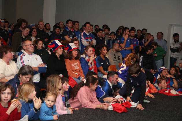 Illustration picture shows fans of France as they gather to watch a soccer game between France and Argentina, the final of the FIFA 2022 World Cup, at The Football Village Brussels , organised at Autoworld car museum, in Brussels on Sunday 18 December 2022. NICOLASxMAETERLINCK  x56770671x