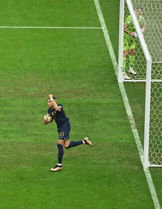 (221218) -- LUSAIER, Dec. 18, 2022 -- Kylian Mbappe of France celebrates his goal during the Final between Argentina and France at the 2022 FIFA World Cup, WM, Weltmeisterschaft, Fussball at Lusail Stadium in Lusail, Qatar, Dec. 18, 2022. ) (SP)QATAR-LUSAIL-2022 WORLD CUP-FINAL-ARG VS FRA XiaoxYijiu 