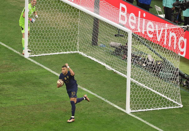 (221218) -- LUSAIER, Dec. 18, 2022 -- Kylian Mbappe of France celebrates his goal during the Final between Argentina and France at the 2022 FIFA World Cup, WM, Weltmeisterschaft, Fussball at Lusail Stadium in Lusail, Qatar, Dec. 18, 2022. ) (SP)QATAR-LUSAIL-2022 WORLD CUP-FINAL-ARG VS FRA XuxZijian