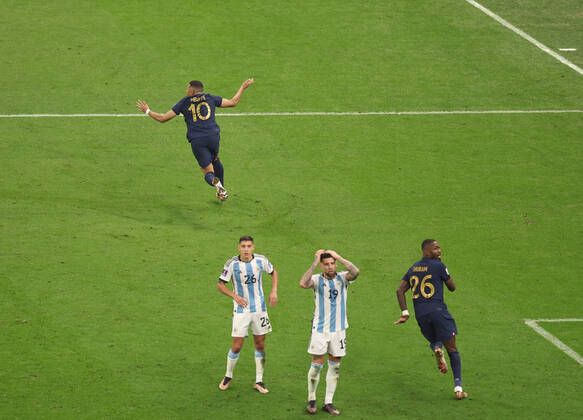 (221218) -- LUSAIER, Dec. 18, 2022 -- Kylian Mbappe (Above) of France celebrates his goal during the Final between Argentina and France at the 2022 FIFA World Cup, WM, Weltmeisterschaft, Fussball at Lusail Stadium in Lusail, Qatar, Dec. 18, 2022. ) (SP)QATAR-LUSAIL-2022 WORLD CUP-FINAL-ARG VS FRA XuxZijian