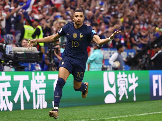 Doha, Qatar, 18th December 2022. Kylan Mbappe of France celebrates scoring their third goal and his hat trick during the FIFA World Cup, WM, Weltmeisterschaft, Fussball 2022 match at Lusail Stadium, Doha. Picture credit should read: David Klein Sportimage EDITORIAL USE ONLY. No use with unauthorised audio, video, data, fixture lists, club league logos or live services. Online in-match use limited to 120 images, no video emulation. No use in betting, games or single club league player publications. SPI-2101-0178