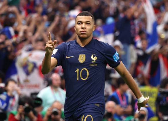 Doha, Qatar, 18th December 2022. Kylan Mbappe of France celebrates scoring their third goal and his hat trick during the FIFA World Cup, WM, Weltmeisterschaft, Fussball 2022 match at Lusail Stadium, Doha. Picture credit should read: David Klein Sportimage EDITORIAL USE ONLY. No use with unauthorised audio, video, data, fixture lists, club league logos or live services. Online in-match use limited to 120 images, no video emulation. No use in betting, games or single club league player publications. SPI-2101-0179