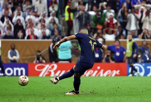 Doha, Qatar, 18th December 2022. Kylan Mbappe of France scoring their third goal and his hat trick during the FIFA World Cup, WM, Weltmeisterschaft, Fussball 2022 match at Lusail Stadium, Doha. Picture credit should read: David Klein Sportimage EDITORIAL USE ONLY. No use with unauthorised audio, video, data, fixture lists, club league logos or live services. Online in-match use limited to 120 images, no video emulation. No use in betting, games or single club league player publications. SPI-2101-0180