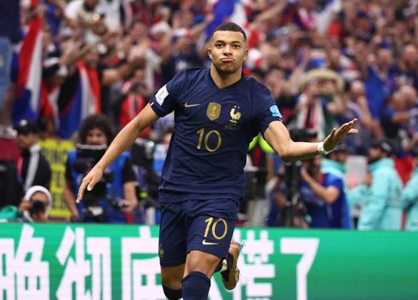 Doha, Qatar, 18th December 2022. Kylan Mbappe of France celebrates scoring their third goal and his hat trick during the FIFA World Cup, WM, Weltmeisterschaft, Fussball 2022 match at Lusail Stadium, Doha. Picture credit should read: David Klein Sportimage EDITORIAL USE ONLY. No use with unauthorised audio, video, data, fixture lists, club league logos or live services. Online in-match use limited to 120 images, no video emulation. No use in betting, games or single club league player publications. SPI-2101-0181
