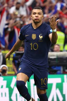 Doha, Qatar, 18th December 2022. Kylan Mbappe of France celebrates scoring their third goal and his hat trick during the FIFA World Cup, WM, Weltmeisterschaft, Fussball 2022 match at Lusail Stadium, Doha. Picture credit should read: David Klein Sportimage EDITORIAL USE ONLY. No use with unauthorised audio, video, data, fixture lists, club league logos or live services. Online in-match use limited to 120 images, no video emulation. No use in betting, games or single club league player publications. SPI-2101-0182