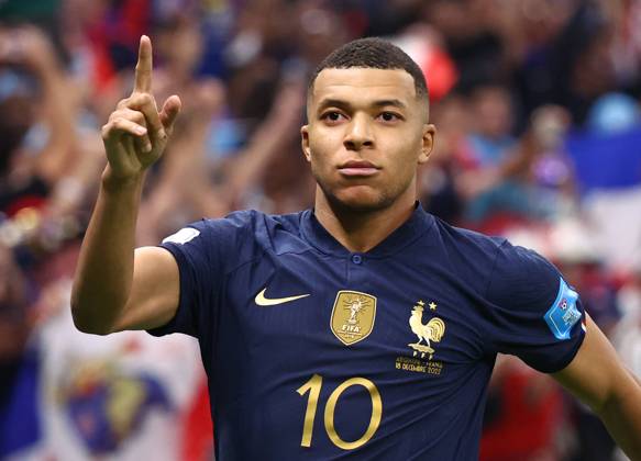 Doha, Qatar, 18th December 2022. Kylan Mbappe of France celebrates scoring their third goal and his hat trick during the FIFA World Cup, WM, Weltmeisterschaft, Fussball 2022 match at Lusail Stadium, Doha. Picture credit should read: David Klein Sportimage EDITORIAL USE ONLY. No use with unauthorised audio, video, data, fixture lists, club league logos or live services. Online in-match use limited to 120 images, no video emulation. No use in betting, games or single club league player publications. SPI-2101-0183