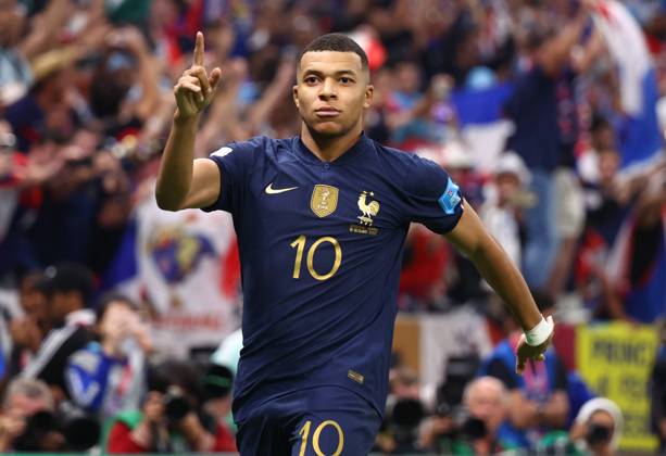 Doha, Qatar, 18th December 2022. Kylan Mbappe of France celebrates scoring their third goal and his hat trick during the FIFA World Cup, WM, Weltmeisterschaft, Fussball 2022 match at Lusail Stadium, Doha. Picture credit should read: David Klein Sportimage EDITORIAL USE ONLY. No use with unauthorised audio, video, data, fixture lists, club league logos or live services. Online in-match use limited to 120 images, no video emulation. No use in betting, games or single club league player publications. SPI-2101-0184