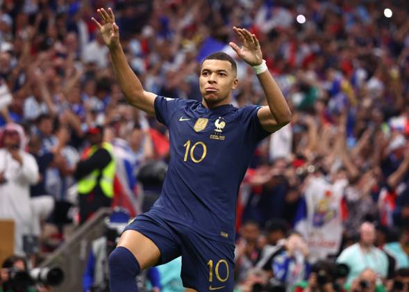 Doha, Qatar, 18th December 2022. Kylan Mbappe of France celebrates scoring their third goal and his hat trick during the FIFA World Cup, WM, Weltmeisterschaft, Fussball 2022 match at Lusail Stadium, Doha. Picture credit should read: David Klein Sportimage EDITORIAL USE ONLY. No use with unauthorised audio, video, data, fixture lists, club league logos or live services. Online in-match use limited to 120 images, no video emulation. No use in betting, games or single club league player publications. SPI-2101-0185