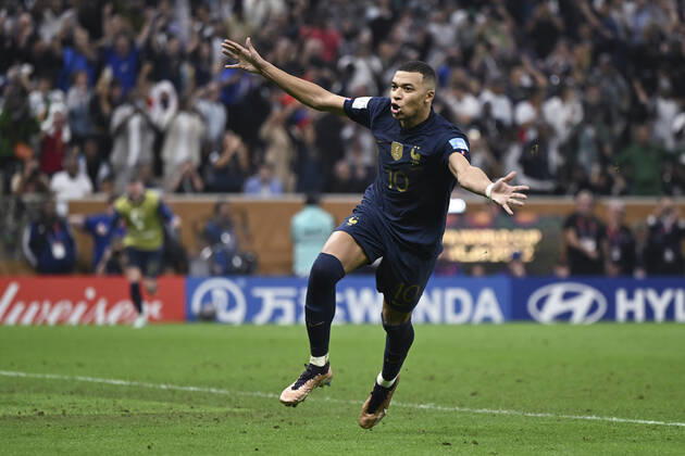 (221218) -- LUSAIER, Dec. 18, 2022 -- Kylian Mbappe of France celebrates his goal during the Final between Argentina and France at the 2022 FIFA World Cup, WM, Weltmeisterschaft, Fussball at Lusail Stadium in Lusail, Qatar, Dec. 18, 2022. ) (SP)QATAR-LUSAIL-2022 WORLD CUP-FINAL-ARG VS FRA LixGa