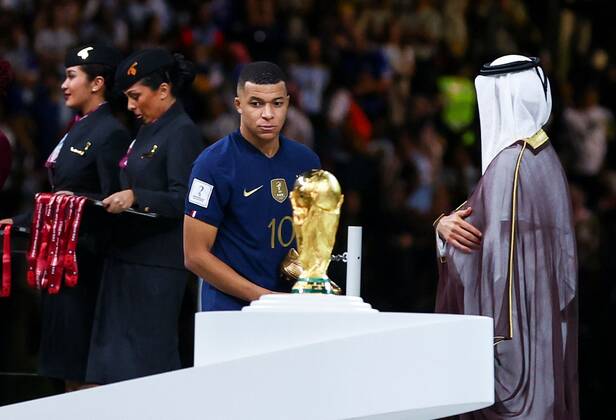 Mandatory Credit: Photo by Kieran McManus Shutterstock (13670809ha) Kylian Mbappe of France wins the golden boot and passes the World Cup trophy Argentina v France, FIFA World Cup, WM, Weltmeisterschaft, Fussball 2022, Final, Football, Lusail Stadium, Al Daayen, Qatar - 18 Dec 2022 Editorial Use Only Argentina v France, FIFA World Cup 2022, Final, Football, Lusail Stadium, Al Daayen, Qatar - 18 Dec 2022 Editorial Use Only Copyright: xKieranxMcManus Shutterstockx 13670809ha