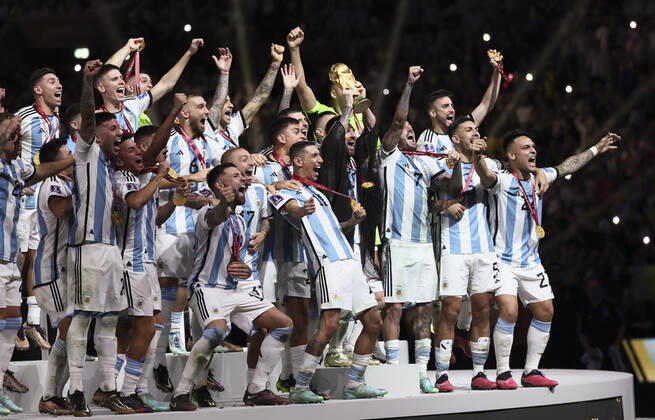 (221218) -- LUSAIL, Dec. 18, 2022 -- Winner Team Argentina celebrate during the awarding ceremony of the 2022 FIFA World Cup, WM, Weltmeisterschaft, Fussball at Lusail Stadium in Lusail, Qatar, Dec. 18, 2022. ) (SP)QATAR-LUSAIL-2022 WORLD CUP-FINAL-ARG VS FRA LanxHongguang 