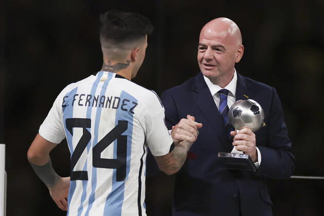(221218) -- LUSAIL, Dec. 18, 2022 -- FIFA President Gianni Infantino (R) presents the young player award to Enzo Fernandez of Argentina during the awarding ceremony of the 2022 FIFA World Cup, WM, Weltmeisterschaft, Fussball at Lusail Stadium in Lusail, Qatar, Dec. 18, 2022. ) (SP)QATAR-LUSAIL-2022 WORLD CUP-FINAL-ARG VS FRA CaoxCan 
