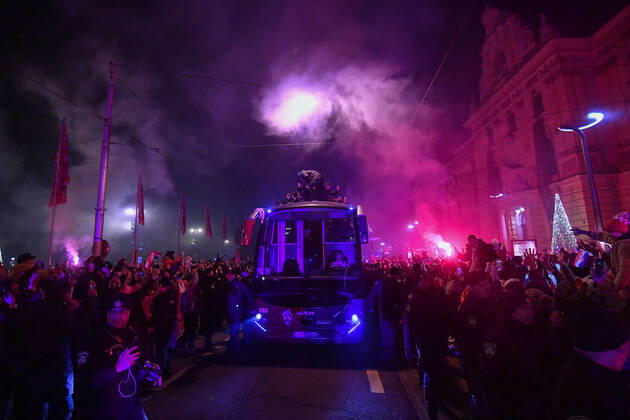 Croatia team victory parade Domagoj Vida of Croatia waves with Croatia flag during the Croatia team victory parade at Ban Jelacic square (following their victory over Morocco in the 2022 FIFA World Cup, WM, Weltmeisterschaft, Fussball bronze medal match the previous day) on December 18, 2022 in Zagreb, Croatia. MarkoxLukunic PIXSELL