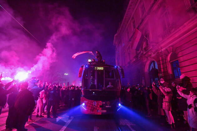 Croatia team victory parade Domagoj Vida of Croatia waves with Croatia flag during the Croatia team victory parade at Ban Jelacic square (following their victory over Morocco in the 2022 FIFA World Cup, WM, Weltmeisterschaft, Fussball bronze medal match the previous day) on December 18, 2022 in Zagreb, Croatia. MarkoxLukunic PIXSELL