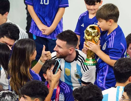 Mandatory Credit: Photo by Javier Garcia Shutterstock (13670815kd) Lionel Messi of Argentina celebrates victory with his wife and children and the World Cup trophy Argentina v France, FIFA World Cup, WM, Weltmeisterschaft, Fussball 2022, Final, Football, Lusail Stadium, Al Daayen, Qatar - 18 Dec 2022 Editorial Use Only Argentina v France, FIFA World Cup 2022, Final, Football, Lusail Stadium, Al Daayen, Qatar - 18 Dec 2022 Editorial Use Only  Copyright: xJavierxGarcia Shutterstockx 13670815kd