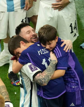 (221218) -- LUSAIL, Dec. 18, 2022 -- Lionel Messi of Argentina celebrates their victory with his families after the penalty shoot-out of the Final between Argentina and France at the 2022 FIFA World Cup, WM, Weltmeisterschaft, Fussball at Lusail Stadium in Lusail, Qatar, Dec. 18, 2022. ) (SP)QATAR-LUSAIL-2022 WORLD CUP-FINAL-ARG VS FRA PanxYulong