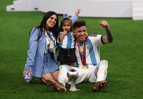 Doha, Qatar, 18th December 2022. Enzo Fernandez of Argentina with his family celebrates winning the Young Player of the Tournament during the FIFA World Cup, WM, Weltmeisterschaft, Fussball 2022 match at Lusail Stadium, Doha. Picture credit should read: David Klein Sportimage EDITORIAL USE ONLY. No use with unauthorised audio, video, data, fixture lists, club league logos or live services. Online in-match use limited to 120 images, no video emulation. No use in betting, games or single club league player publications. SPI-2101-0208