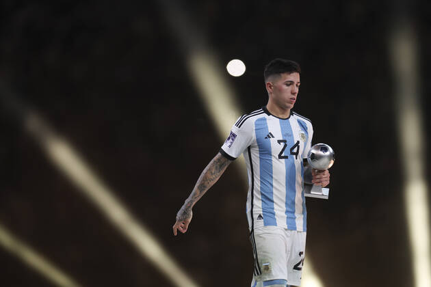 (221218) -- LUSAIER, Dec. 18, 2022 -- Enzo Fernandez of Argentina reacts with the FIFA Young Player award during the awarding ceremony of the 2022 FIFA World Cup, WM, Weltmeisterschaft, Fussball at Lusail Stadium in Lusail, Qatar, Dec. 18, 2022. ) (SP)QATAR-LUSAIL-2022 WORLD CUP-FINAL-ARG VS FRA LixMing 