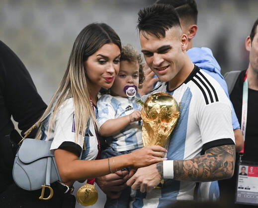 (221218) -- LUSAIER, Dec. 18, 2022 -- Lautaro Martinez (R) of Argentina celebrates with his family during the awarding ceremony of the 2022 FIFA World Cup, WM, Weltmeisterschaft, Fussball at Lusail Stadium in Lusail, Qatar, Dec. 18, 2022. ) (SP)QATAR-LUSAIL-2022 WORLD CUP-FINAL-ARG VS FRA LixGa 
