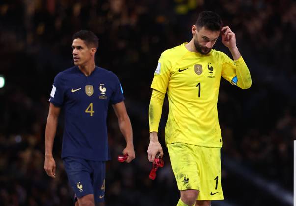 Doha, Qatar, 18th December 2022. Raphael Varane of France and Hugo Lloris of France dejected as they collect their losers medals during the FIFA World Cup, WM, Weltmeisterschaft, Fussball 2022 match at Lusail Stadium, Doha. Picture credit should read: David Klein Sportimage EDITORIAL USE ONLY. No use with unauthorised audio, video, data, fixture lists, club league logos or live services. Online in-match use limited to 120 images, no video emulation. No use in betting, games or single club league player publications. SPI-2101-0230