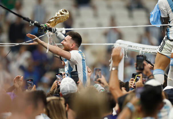 (221218) -- LUSAIL, Dec. 18, 2022 -- Lionel Messi of Argentina celebrates after the awarding ceremony of the 2022 FIFA World Cup, WM, Weltmeisterschaft, Fussball at Lusail Stadium in Lusail, Qatar, Dec. 18, 2022. ) (SP)QATAR-LUSAIL-2022 WORLD CUP-FINAL-ARG VS FRA WangxLili