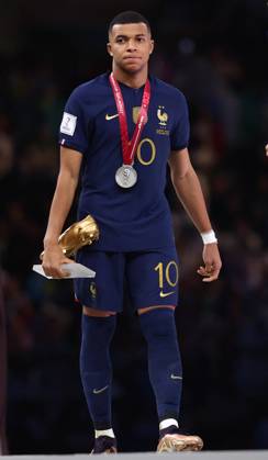Doha, Qatar, 18th December 2022. Kylan Mbappe of France dejected as he collects his Golden Boot award during the FIFA World Cup, WM, Weltmeisterschaft, Fussball 2022 match at Lusail Stadium, Doha. Picture credit should read: David Klein Sportimage EDITORIAL USE ONLY. No use with unauthorised audio, video, data, fixture lists, club league logos or live services. Online in-match use limited to 120 images, no video emulation. No use in betting, games or single club league player publications. SPI-2101-0234