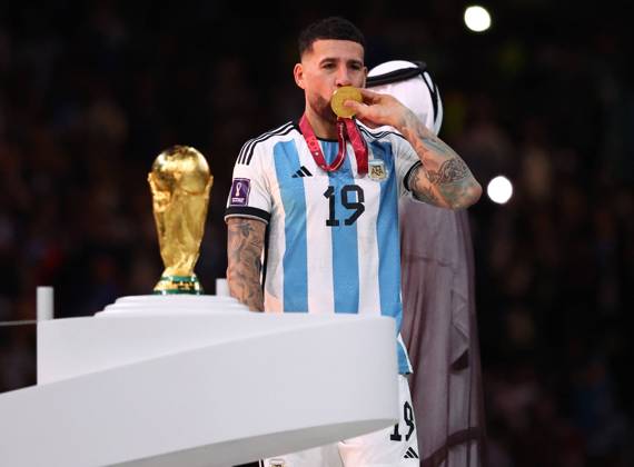 Doha, Qatar, 18th December 2022. Nicolas Otamendi of Argentina kisses his winners medal during the FIFA World Cup, WM, Weltmeisterschaft, Fussball 2022 match at Lusail Stadium, Doha. Picture credit should read: David Klein Sportimage EDITORIAL USE ONLY. No use with unauthorised audio, video, data, fixture lists, club league logos or live services. Online in-match use limited to 120 images, no video emulation. No use in betting, games or single club league player publications. SPI-2101-0239