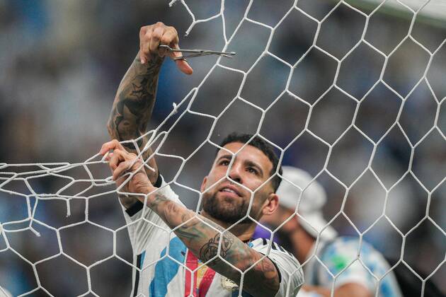 Mandatory Credit: Photo by Dave Shopland Shutterstock (13670813ev) Nicolas Otamendi of Argentina cuts the netting from the goal as Argentina celebrate after winning the penalty shootout Argentina v France, FIFA World Cup, WM, Weltmeisterschaft, Fussball 2022, Final, Football, Lusail Stadium, Al Daayen, Qatar - 18 Dec 2022 Editorial Use Only Argentina v France, FIFA World Cup 2022, Final, Football, Lusail Stadium, Al Daayen, Qatar - 18 Dec 2022 Editorial Use Only Copyright: xDavexShopland Shutterstockx 13670813ev