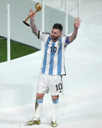(221219) -- LUSAIL, Dec. 18, 2022 -- Lionel Messi of Argentina celebrates his golden ball award during the awarding ceremony of the 2022 FIFA World Cup, WM, Weltmeisterschaft, Fussball at Lusail Stadium in Lusail, Qatar, Dec. 18, 2022. ) (SP)QATAR-LUSAIL-2022 WORLD CUP-FINAL-ARG VS FRA PanxYulong