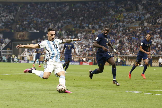LUSAIL, QATAR - DECEMBER 18: Player of Argentina Lautaro Martinez passes the ball during the FIFA World Cup, WM, Weltmeisterschaft, Fussball Qatar 2022 Final match between Argentina and France at Lusail Stadium on December 18, 2022 in Lusail, Qatar. (Photo by Florencia Tan Jun PxImages Icon Sportwire) SOCCER: DEC 18 FIFA World Cup Final - France v Argentina Icon2212181577