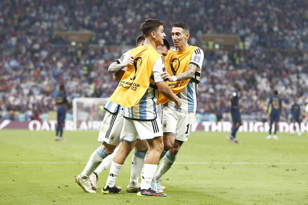 LUSAIL, QATAR - DECEMBER 18: Player of Argentina Lionel Messi celebrates with his teammates after scoring a goal during the FIFA World Cup, WM, Weltmeisterschaft, Fussball Qatar 2022 Final match between Argentina and France at Lusail Stadium on December 18, 2022 in Lusail, Qatar. (Photo by Florencia Tan Jun PxImages Icon Sportwire) SOCCER: DEC 18 FIFA World Cup Final - France v Argentina Icon2212181584