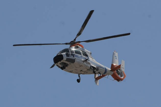 (221221) -- BUENOS AIRES, Dec. 21, 2022 -- A helicopter carrying members of Team Argentina is seen after the team winning the Final of the 2022 FIFA World Cup, WM, Weltmeisterschaft, Fussball in Buenos Aires, capital of Argentina, Dec. 20, 2022. ( Handout via Xinhua) (SP)ARGENTINA-BUENOS AIRES-FOOTBALL-2022 WORLD CUP-CELEBRATION TELAM 