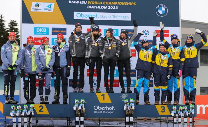 BIATHLON - IBU WC Oberhof OBERHOF,GERMANY,19.FEB.23 - BIATHLON - IBU World Championships 2023, 4x6 km relay, ladies, award ceremony. Image shows the rejoicing of team Germany, team Italy and team Sweden. Keywords: medal.  GEPAxpictures xThomasxBachun
