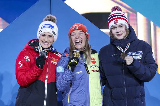 NORDIC SKIING - FIS Nordic WC Planica 2023 KRANJSKA GORA,SLOVENIA,24.FEB.23 - NORDIC SKIING - FIS Nordic World Ski Championships, medal plaza, award ceremony. Image shows Eva Pinkelnig (AUT), Katharina Althaus (GER) and Anna Odine Stroem (NOR). Keywords: medal.  GEPAxpictures xPatrickxSteiner