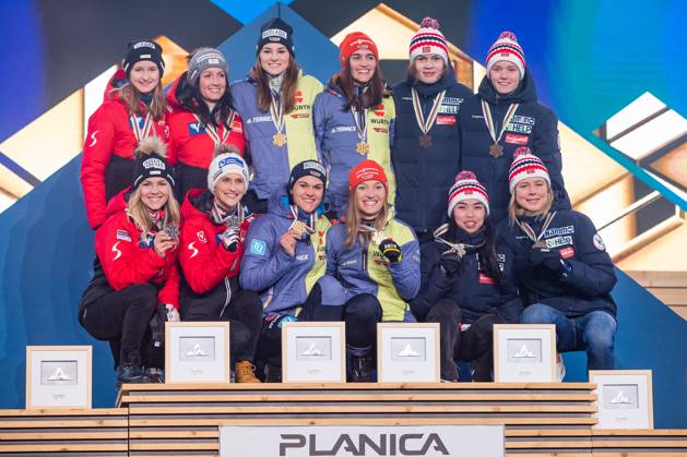 NORDIC SKIING - FIS Nordic WC Planica 2023 KRANJSKA GORA,SLOVENIA,25.FEB.23 - NORDIC SKIING, Ski jumping, Skispringen, Ski, nordisch - FIS Nordic World Ski Championships, medal plaza, award ceremony. Image shows Austrian, German and Norwegian teams.  GEPAxpictures xGintarexKarpaviciute