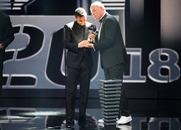 (230228) -- PARIS, Feb. 28, 2023 -- Argentina s Lionel Messi (L) receives the Best FIFA Men s Player Award from FIFA President Gianni Infantino during the Best FIFA Football Awards 2022 ceremony in Paris, France, Feb. 27, 2023. (Photo by Xinhua) (SP)FRANCE-PARIS-FOOTBALL-BEST FIFA MEN S PLAYER AWARD-MESSI GlennxGervot 