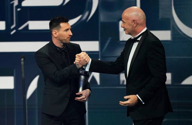 (230228) -- PARIS, Feb. 28, 2023 -- Argentina s Lionel Messi (L) greets FIFA President Gianni Infantino after receiving the Best FIFA Men s Player Award during the Best FIFA Football Awards 2022 ceremony in Paris, France, Feb. 27, 2023. (Photo by Xinhua) (SP)FRANCE-PARIS-FOOTBALL-BEST FIFA MEN S PLAYER AWARD-MESSI GlennxGervot 