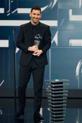 (230228) -- PARIS, Feb. 28, 2023 -- Argentina s Lionel Messi reacts after receiving the Best FIFA Men s Player Award during the Best FIFA Football Awards 2022 ceremony in Paris, France, Feb. 27, 2023. (Photo by Xinhua) (SP)FRANCE-PARIS-FOOTBALL-BEST FIFA MEN S PLAYER AWARD-MESSI GlennxGervot 