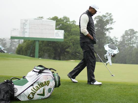 Tiger Woods walks to ball on the 18th hole during the rain-delayed second round at the 87th Masters tournament at Augusta National Golf Club in Augusta, Georgia on Saturday, April 8, 2023. Woods finished at 147, 3 shots over par, but made the cut for the 23rd consecutive time tying Gary Player and Fred Couples.  AUG20230408217 BOBxSTRONG