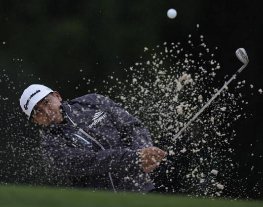 Kurt Kitayama hits from the bunker at the 18th hole during the second round at the 87th Masters tournament at Augusta National Golf Club in Augusta, Georgia on Saturday, April 8, 2023. Kitayama missed the cut finishing at 152.  AUG20230408226 BOBxSTRONG