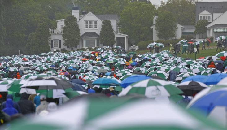 Golf: Masters Tournament Spectators leave the grounds after play was suspended for the day due to bad weather during the third round of the Masters Tournament at Augusta National Golf Club in Augusta, Georgia, on April 8, 2023.  A14AA0001414709P 