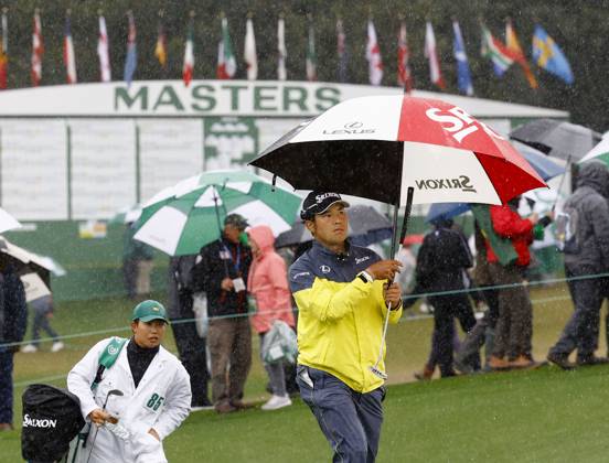 Golf: Masters Tournament Japan s Hideki Matsuyama walks with an umbrella during the third round of the Masters Tournament at Augusta National Golf Club in Augusta, Georgia, on April 8, 2023.  A14AA0001414711P 