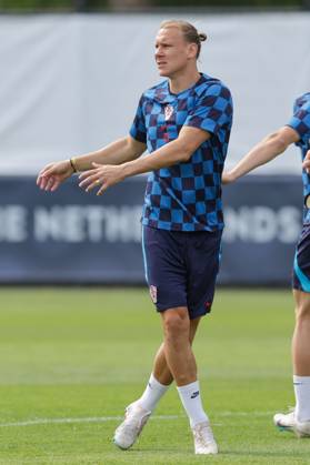 Training of the Croatian national football team Domagoj Vida of Croatia at the training of the Croatian national football team on the field of Feyenoord s football academy in Rotterdam, Netherlands on June 17, 2023. LukaxStanzl PIXSELL