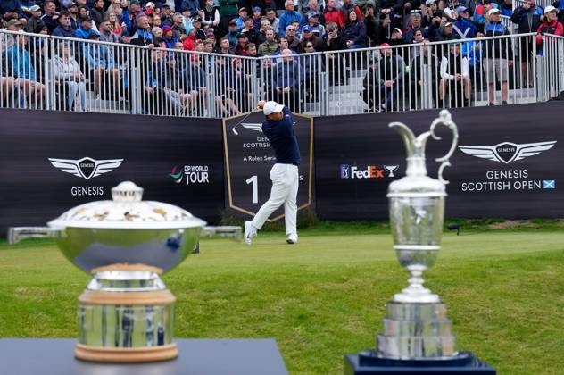 Mandatory Credit: Photo by Stuart Wallace Shutterstock (14003901a) Tom Kim (KOR) plays his tee shot on the 1st hole during the final round, flanked by the Genesis Scottish Open trophy and the Claret Jug. Genesis Scottish Open, Day Four, Golf, The Renaissance Club, North Berwick, UK - 16 Jul 2023 Genesis Scottish Open, Day Four, Golf, The Renaissance Club, North Berwick, UK - 16 Jul 2023 Copyright: xStuartxWallace Shutterstockx 14003901a