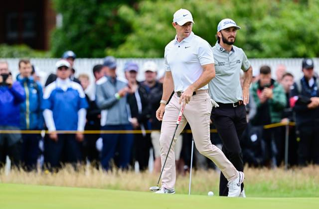 Mandatory Credit: Photo by Greig Cowie Shutterstock (14015635ay) Rory McIlroy walks up on the 2nd Green with Max Homa The British Open Championship, Day Three, Golf, Royal Liverpool Golf Club, Liverpool, UK - 22 Jul 2023 The British Open Championship, Day Three, Golf, Royal Liverpool Golf Club, Liverpool, UK - 22 Jul 2023  Copyright: xGreigxCowie Shutterstockx 14015635ay