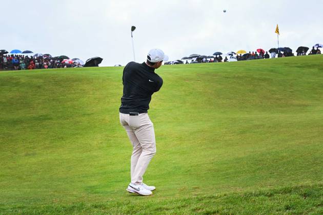Mandatory Credit: Photo by Greig Cowie Shutterstock (14015635cy) Rory McIlroy chips on the 12th Green The British Open Championship, Day Three, Golf, Royal Liverpool Golf Club, Liverpool, UK - 22 Jul 2023 The British Open Championship, Day Three, Golf, Royal Liverpool Golf Club, Liverpool, UK - 22 Jul 2023  Copyright: xGreigxCowie Shutterstockx 14015635cy