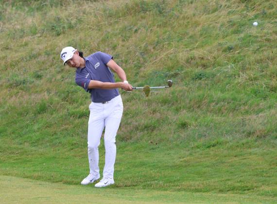 Australian Min Woo Lee hits out of the rough on the eleventh hole on the third day at the 151st Open Championship at Royal Liverpool Golf Club in Hoylake, England on Saturday, July 22, 2023.  LON2023072248 HUGOxPHILPOTT