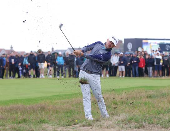 American Brian Harman plays out of the rough on the fourth hole on the third day at the 151st Open Championship at Royal Liverpool Golf Club in Hoylake, England on Saturday, July 22, 2023.  LON2023072229 HUGOxPHILPOTT