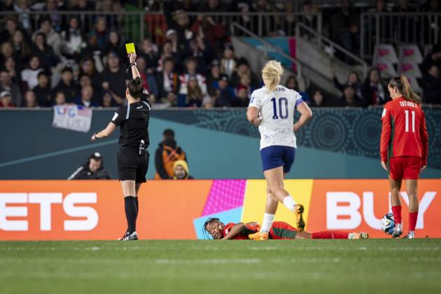 August 1, 2023, Auckland, Auckland, New Zealand: Portugal forward JESSICA SILVA 10 lies on the ground after being hit by USA defender NAOMI GIRMA 4 and being served a yellow card from the referee during the second half of the 2023 FIFA Womens World Cup Group E match against Portugal at the Eden Park Stadium in Auckland, New Zealand. USA 0:0 Portugal Auckland New Zealand - ZUMAb240 20230801_zsp_b240_028 Copyright: xIraxL.xBlackx